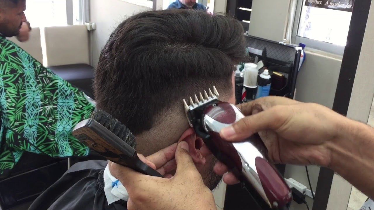 Corte de pelo solidario en Ituzaingó